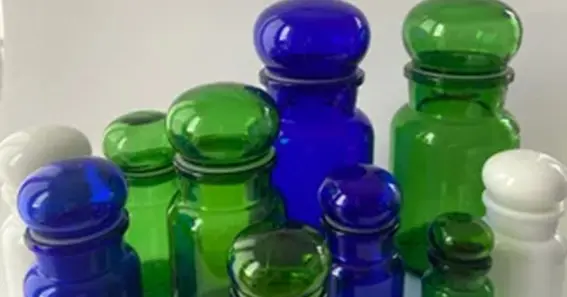 17th c green glass footed bottle